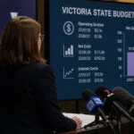 Victoria bütçesi ve borç tahminlerini temsil eden basın bilgilendirmesi görsel
