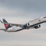 Air Canada pilotuna lisanssız kaptanlık suçlaması konulu temsili editoryal görsel