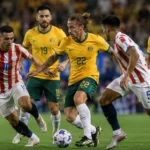 Socceroos, Paraguay maçının ardından tur atladı konulu temsili editoryal görsel